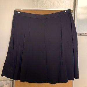 Black skirt, stretch waist. 28 inches long